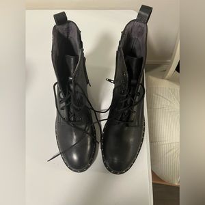 Women’s Size 10 black leather boots by Seycheller with silver studs around boots